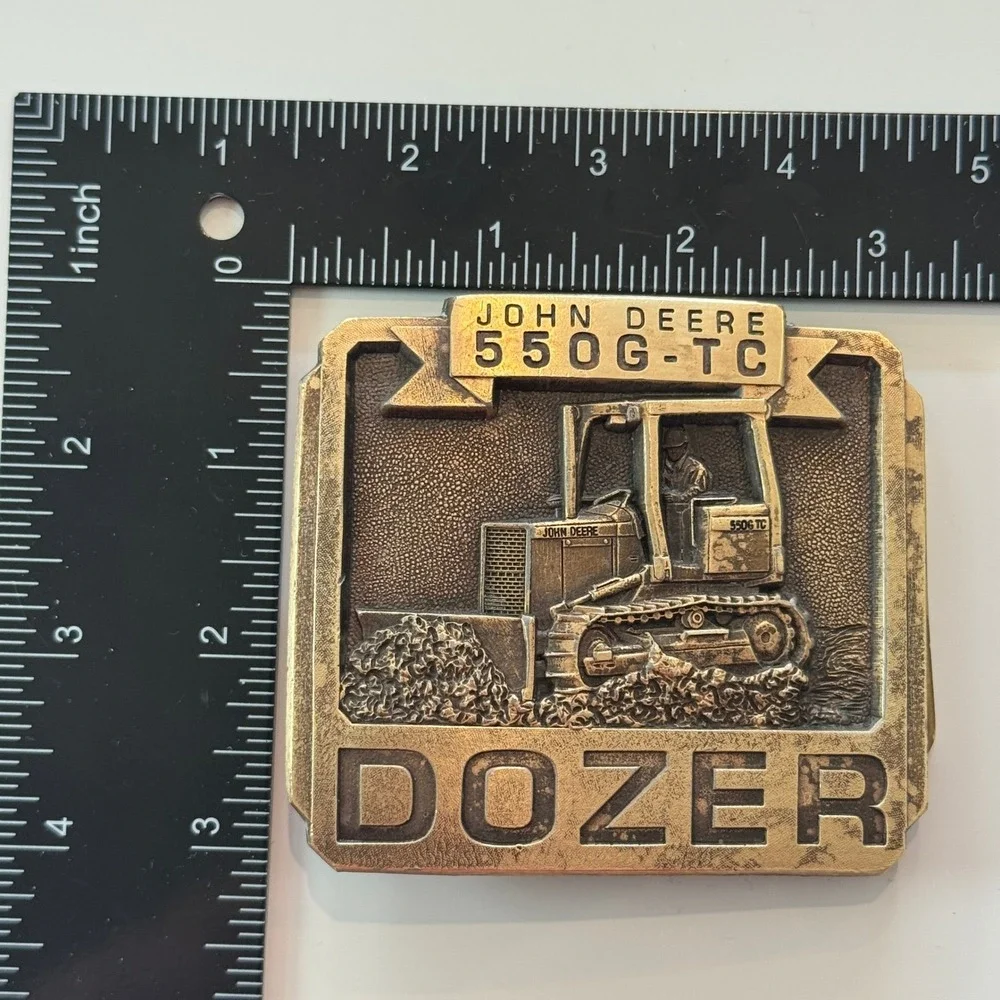 John Deere vintage brass